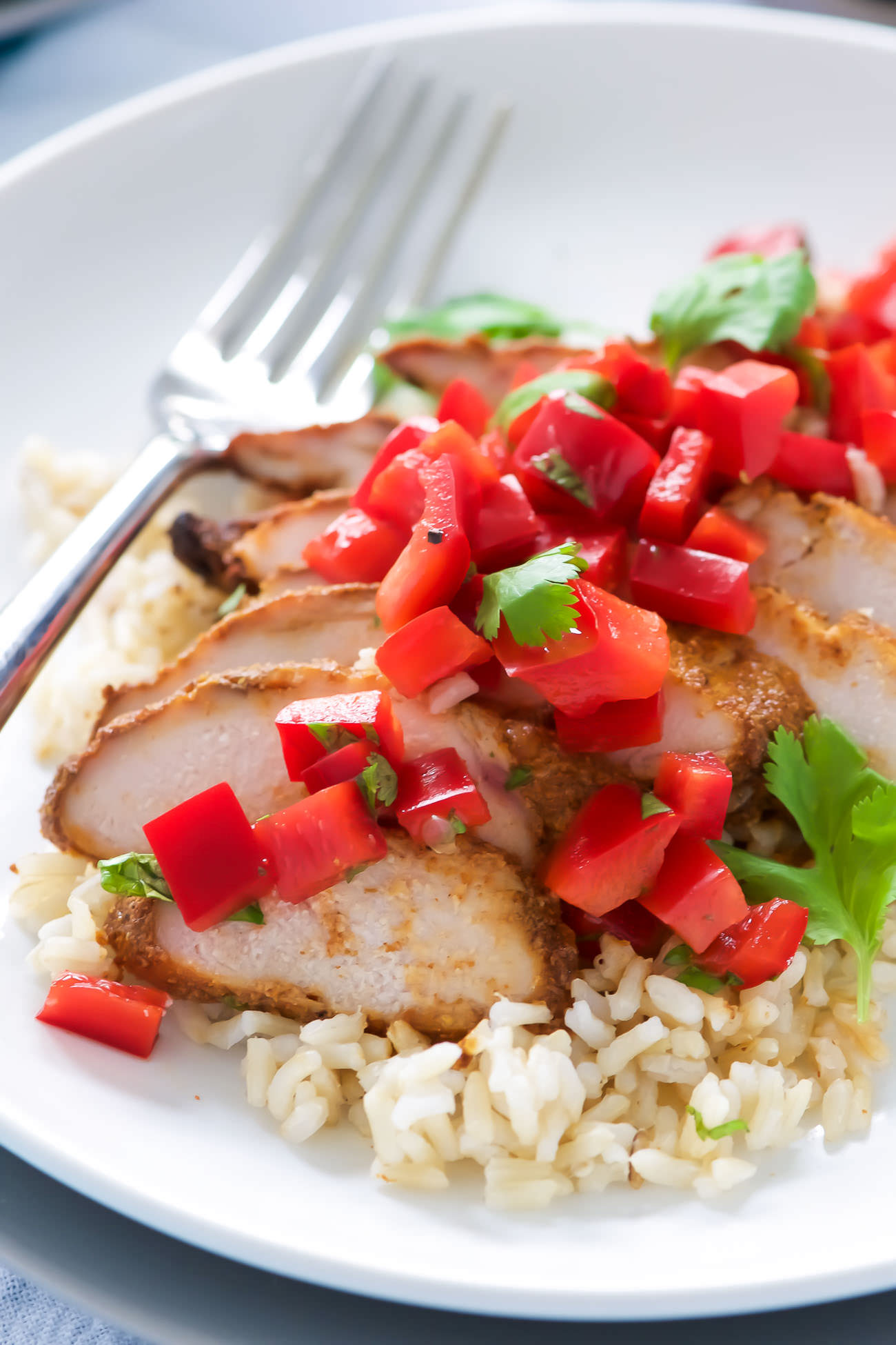 Tequila Honey Lime Chicken - juicy chicken marinated in a smoky chipotle, a touch of honey and chili powder then finished with a super quick and fresh red pepper salsa!