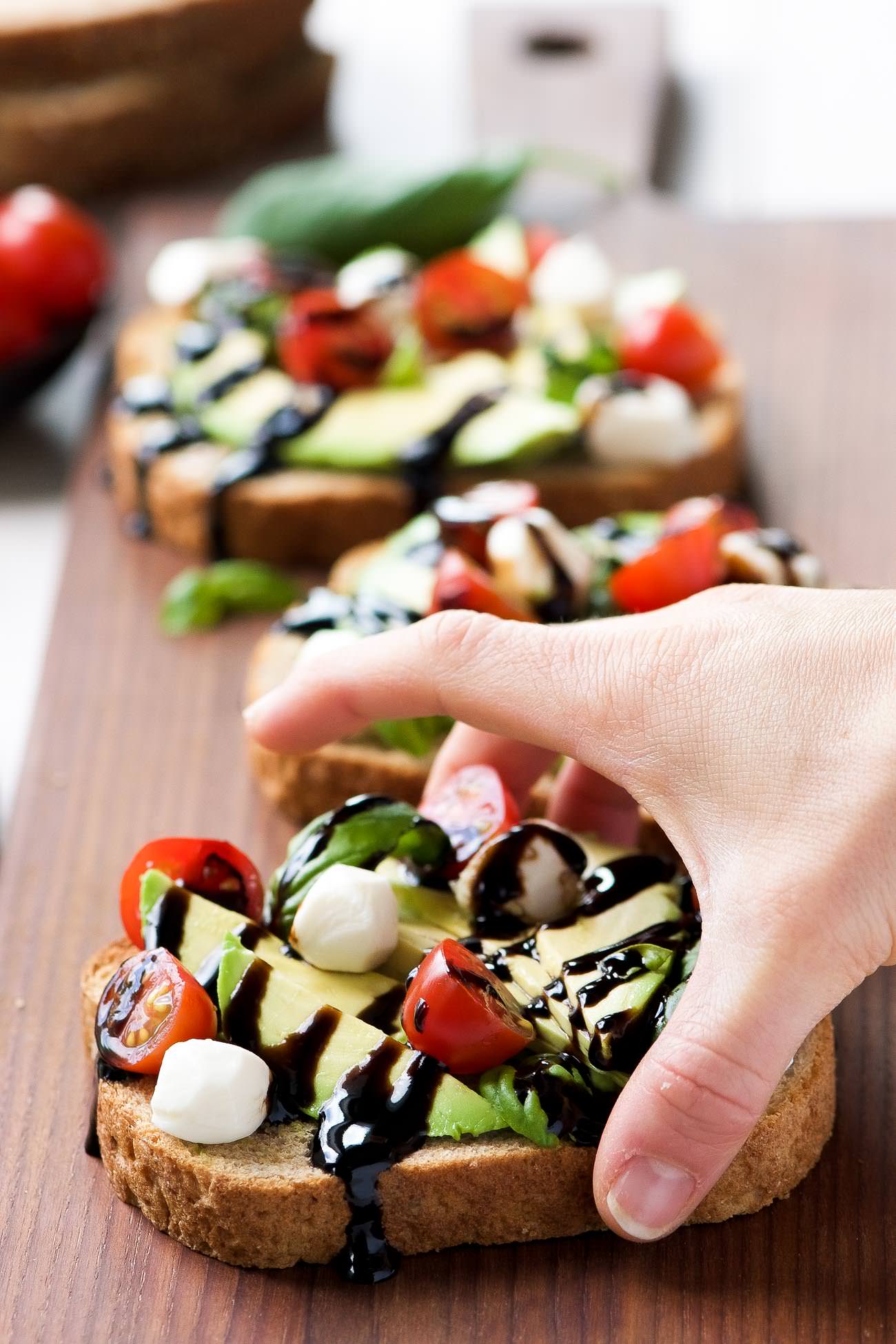 Caprese Avocado Toast is my go to, healthy snack! Full of good for you ingredients, this snack is ready in 10 minutes and easy enough to feed a crowd! 
