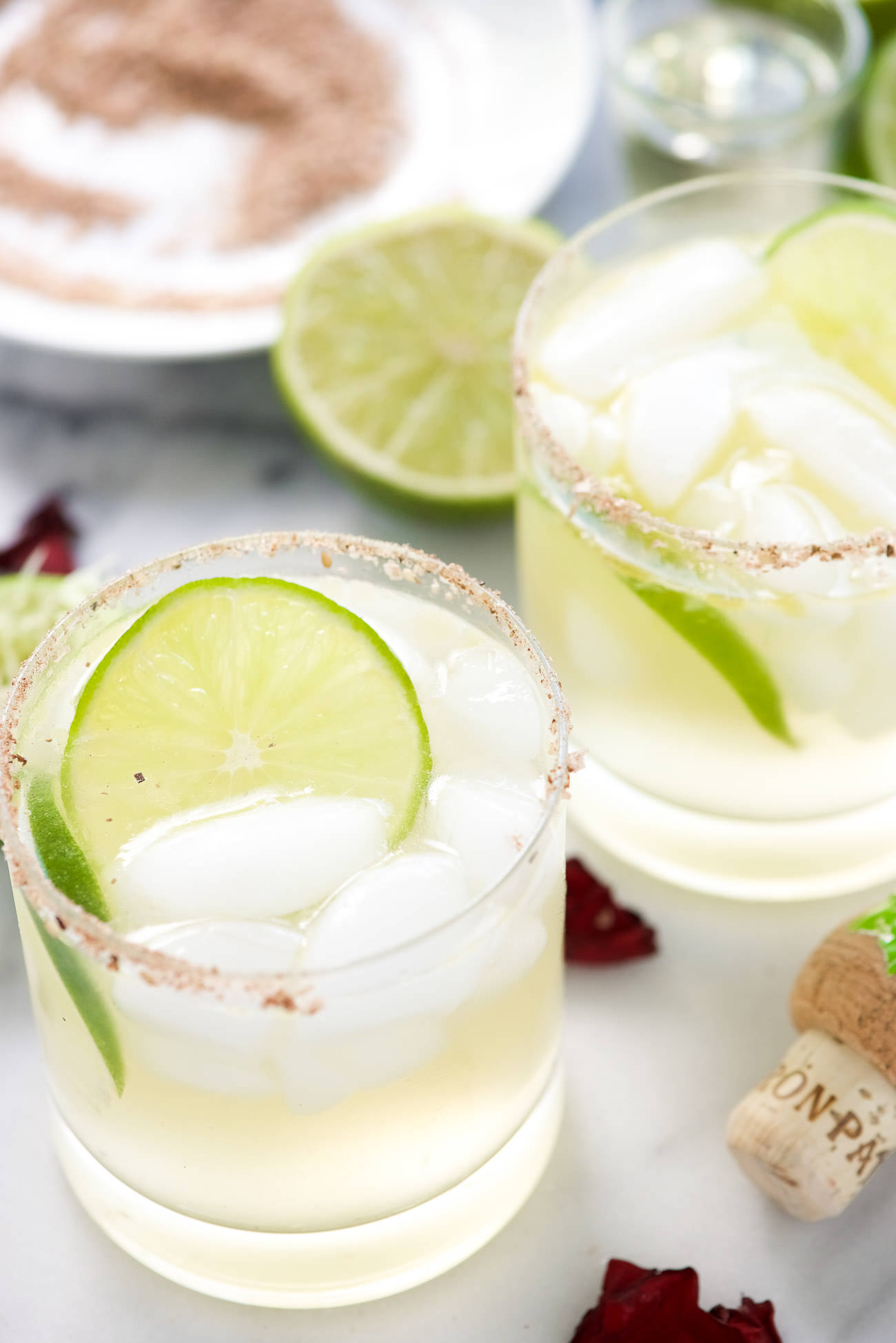 This is the best Spicy Margarita recipe out there! Starts with a base of fresh lime juice, silver tequila and agave then spiced with a bit of jalapeño for a refreshing cocktail!