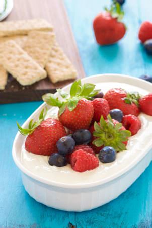 Lemon Berry Cheesecake Dip is the best of both words - dessert and a dip! Luscious, creamy cheesecake dip with a hint of lemon is topped with juicy berries coated in a touch of maple syrup! An irresistible combination that will be the hit of any party!