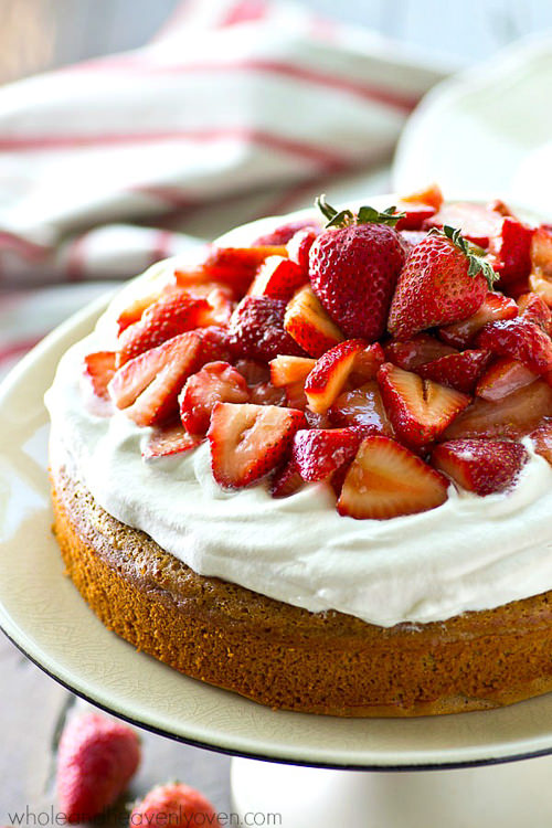 Classic summertime strawberry shortcake is made EASY in this single-layer yellow cake that’s piled high with fluffy whipped cream and lots of fresh strawberry sauce!
