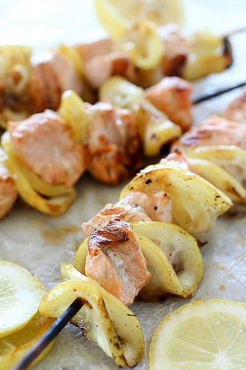 Salmon Skewers tossed in an easy garlic-lemon sauce and then grilled. The result? A crazy delicious, tender, lemon salmon that is like heaven on a stick!