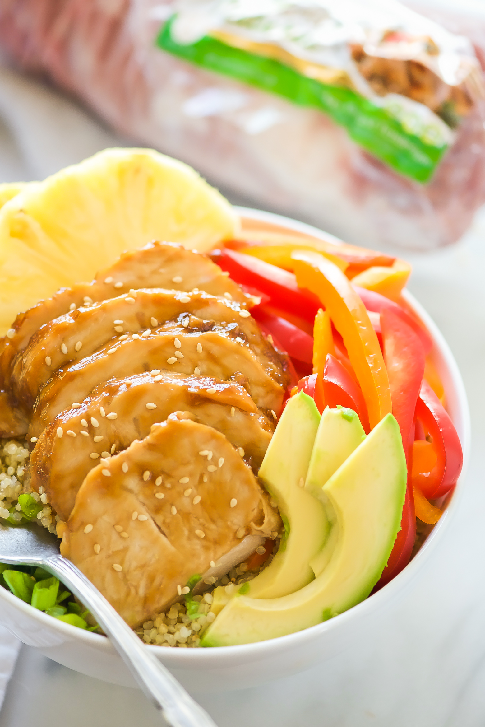 Honey Soy Glazed Hawaiian Bowls pack a serious flavor punch! Honey soy glazed turkey tenderloins are baked then added to bowl filled with rice, juicy pineapple, peppers, onions, and avocados. This one dish wonder is perfect for any weeknight dinner!