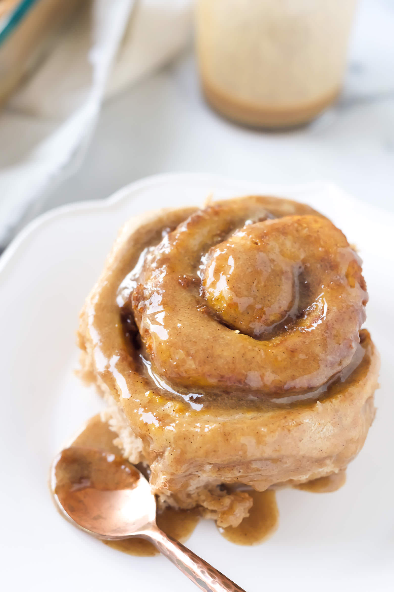 These Pumpkin Cake Mix Cinnamon Rolls are made easier by starting with a cake mix then drizzled in a delicious brown sugar maple glaze! Your family will love waking up to these!